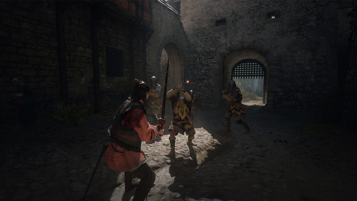 In a castle courtyard, Coen holds his sword ready to defend himself against a trio of knights.