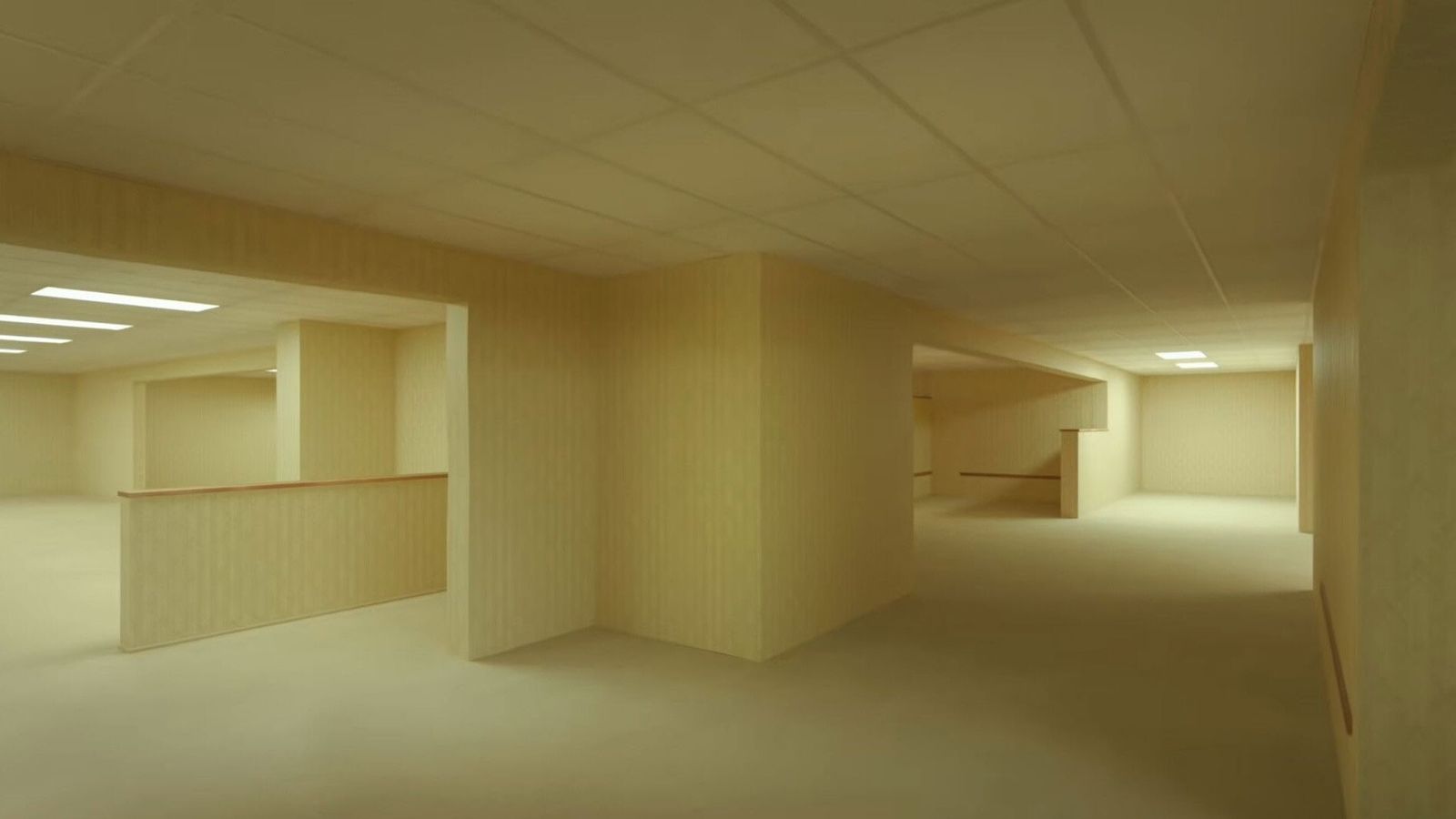 An endless maze of yellow, fluorescent-lit liminal rooms from the movie Backrooms
