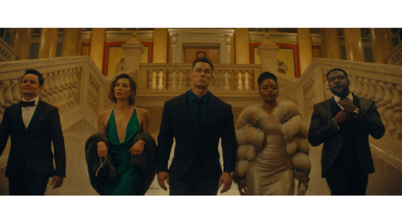 Official first-look image from Apple TV's Matchbox The Movie starring Jessica Biel and John Cena