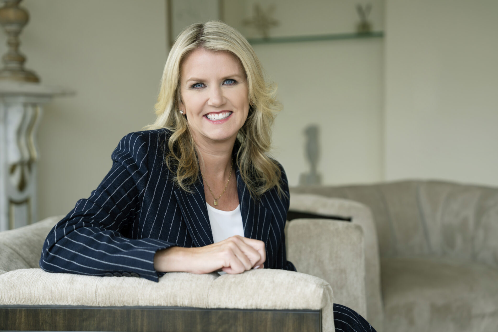Amy Coleman, Microsoft's Executive Vice President and Chief People Officer, smiling in an official portrait