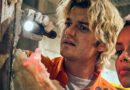 Joe Keery as Teacake and Georgina Campbell as Naomi investigate a wall in Cold Storage