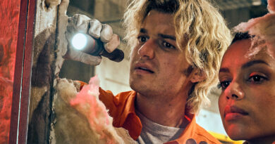 Joe Keery as Teacake and Georgina Campbell as Naomi investigate a wall in Cold Storage