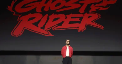 Ryan Gosling on stage in front of the Ghost Rider logo at San Diego Comic-Con 2026