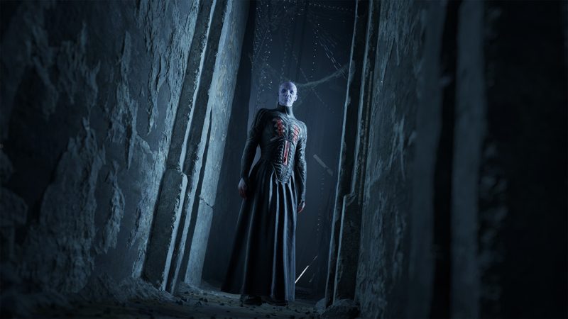 A Cenobite in a stone corridor in Clive Barker's Hellraiser: Revival