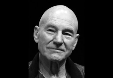 Black-and-white portrait of Sir Patrick Stewart, the actor known as Captain Jean-Luc Picard and Professor X, who died at 86