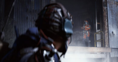 Two armored Raiders facing off inside an industrial building in ARC Raiders