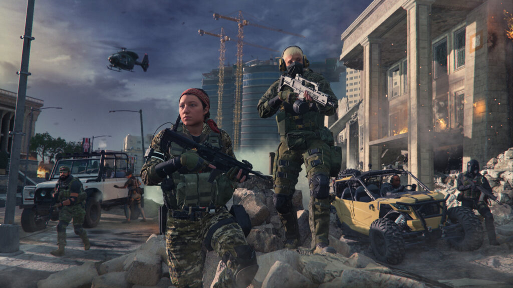 Soldiers advancing through a burning city street in Call of Duty: Modern Warfare III