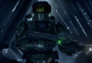 Master Chief holds his assault rifle in a dark corridor in Halo: Campaign Evolved