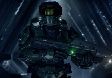 Master Chief holds his assault rifle in a dark corridor in Halo: Campaign Evolved