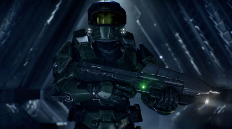 Master Chief holds his assault rifle in a dark corridor in Halo: Campaign Evolved