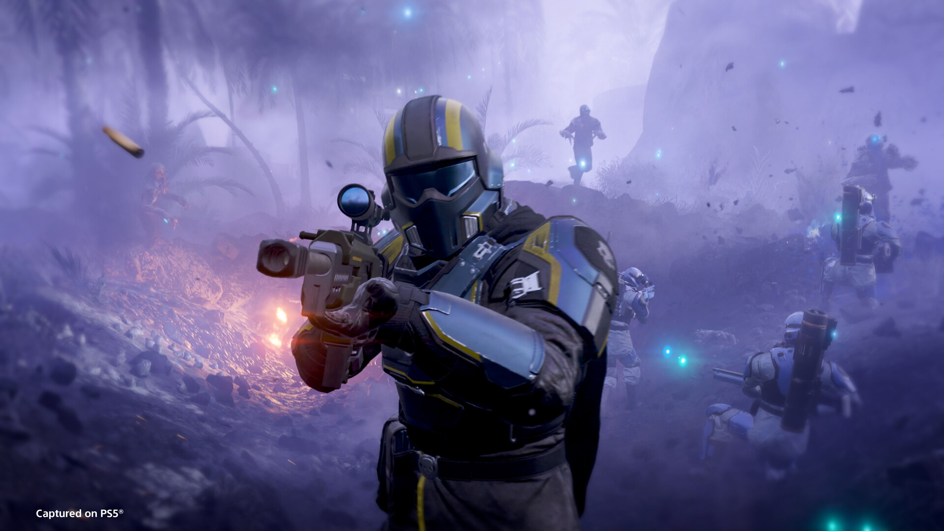 Helldivers 2 squad advancing through a misty battlefield while taking fire