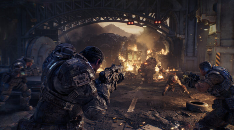 Gears of War E-Day best settings, Gears fighting through a burning street under a bridge