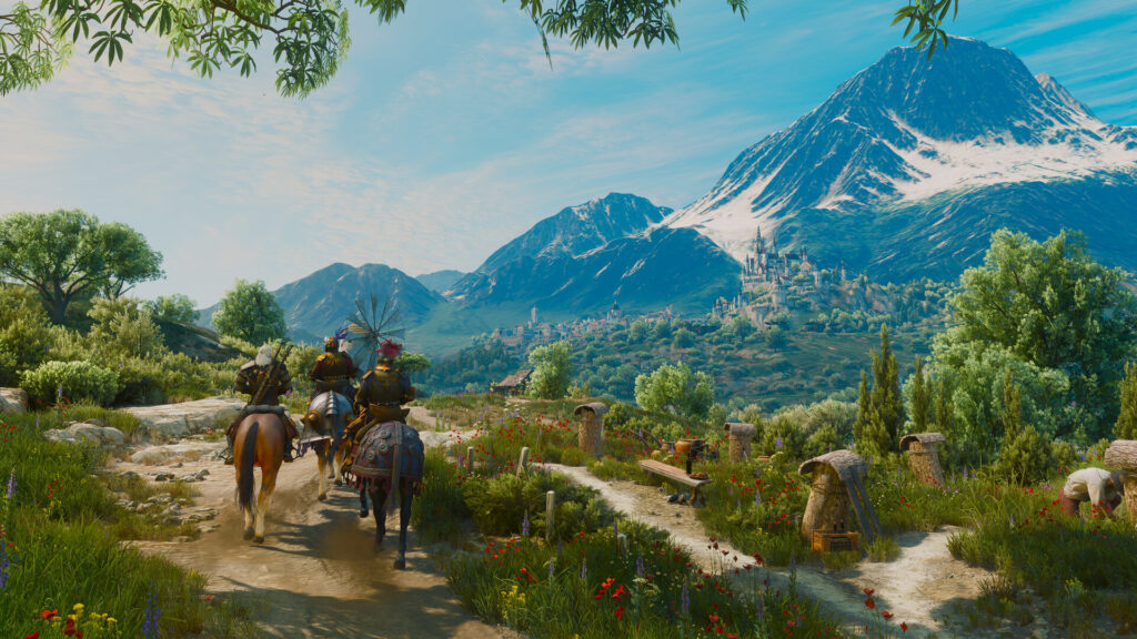 Riders travel along a mountain road in The Witcher 3 Wild Hunt Remastered