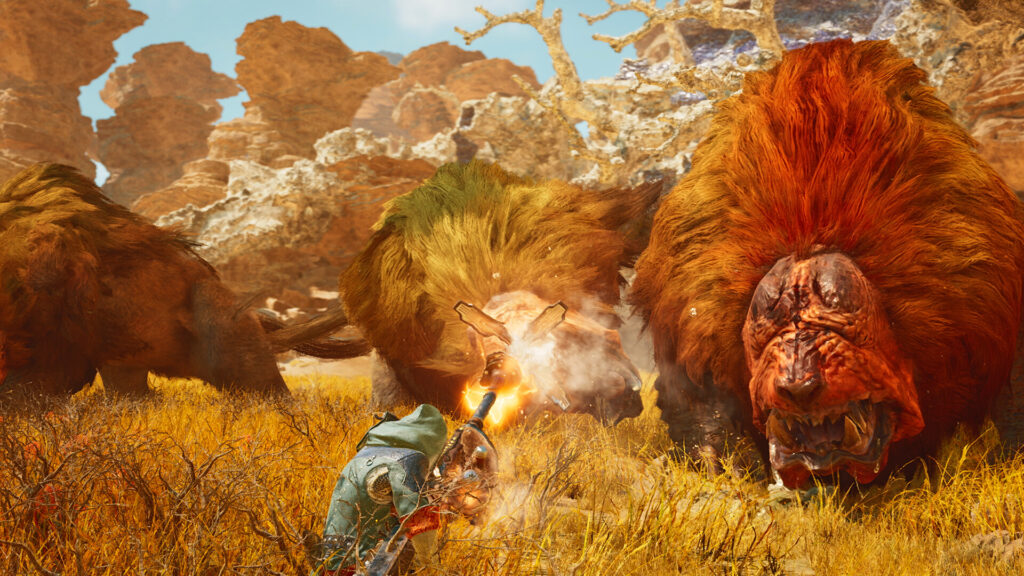 A hunter faces off against a large maned monster in a rocky canyon in Monster Hunter Wilds