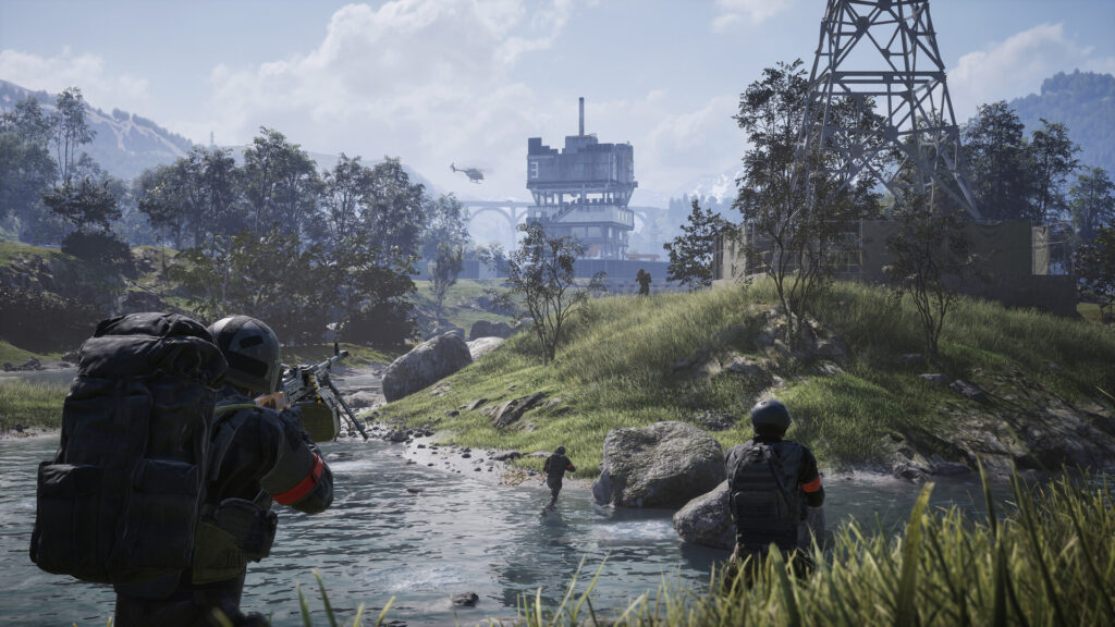 WARDOGS squad crossing a river toward a tower on the hill