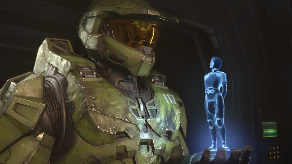 Master Chief stands next to the AI known as the Weapon in Halo Infinite