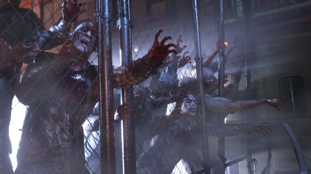 A horde of zombies pressing against a fence in Raccoon City in Resident Evil 3